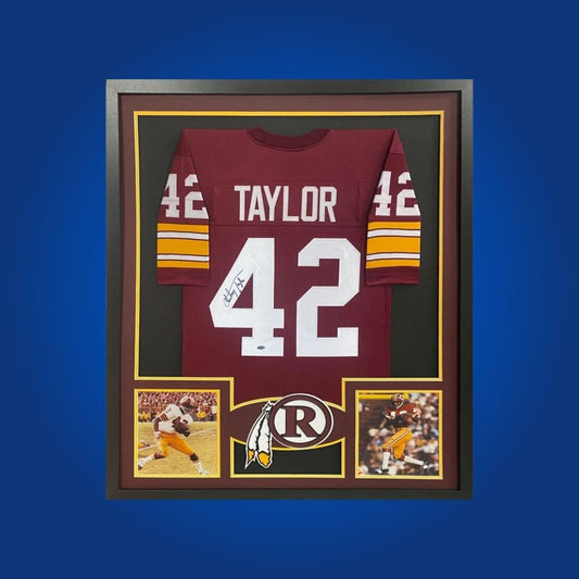 Autographed Washington Commanders custom jersey by Charley Taylor with Certificate of Authenticity.