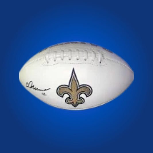 Saints logo football autographed by Chris Olave, signature clearly presented.