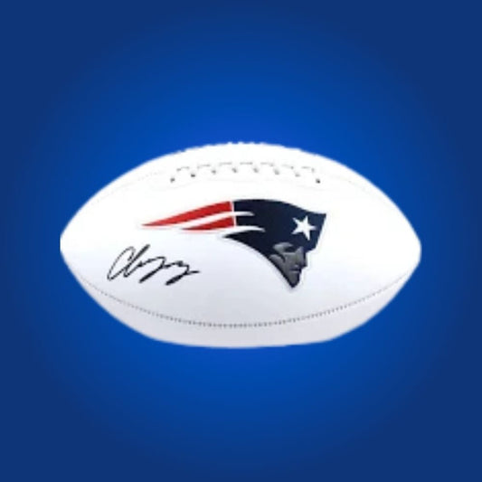 Football signed by Christian Gonzalez, displaying the Patriots logo and clear signature.