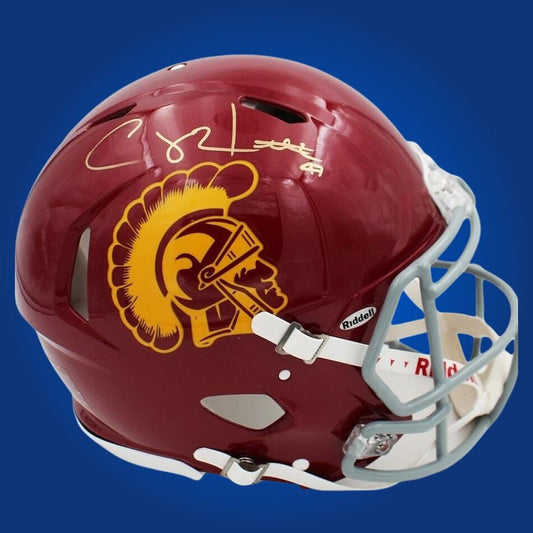 Autographed full size Authentic Helmet by Clay Matthews, celebrated USC Trojans linebacker and NFL star, showcased on a neutral white backdrop. A standout piece for Trojans fans and collectors. SportsMarkets memorabilia photo.