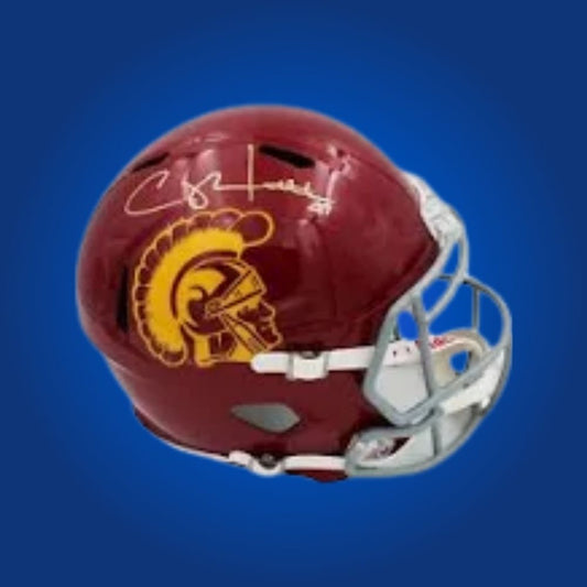 Autographed full size replica helmet by Clay Matthews, renowned USC Trojans linebacker and NFL star, featured on a clean white backdrop for catalog consistency. A must-have item for fans and collectors alike. SportsMarkets memorabilia photo.