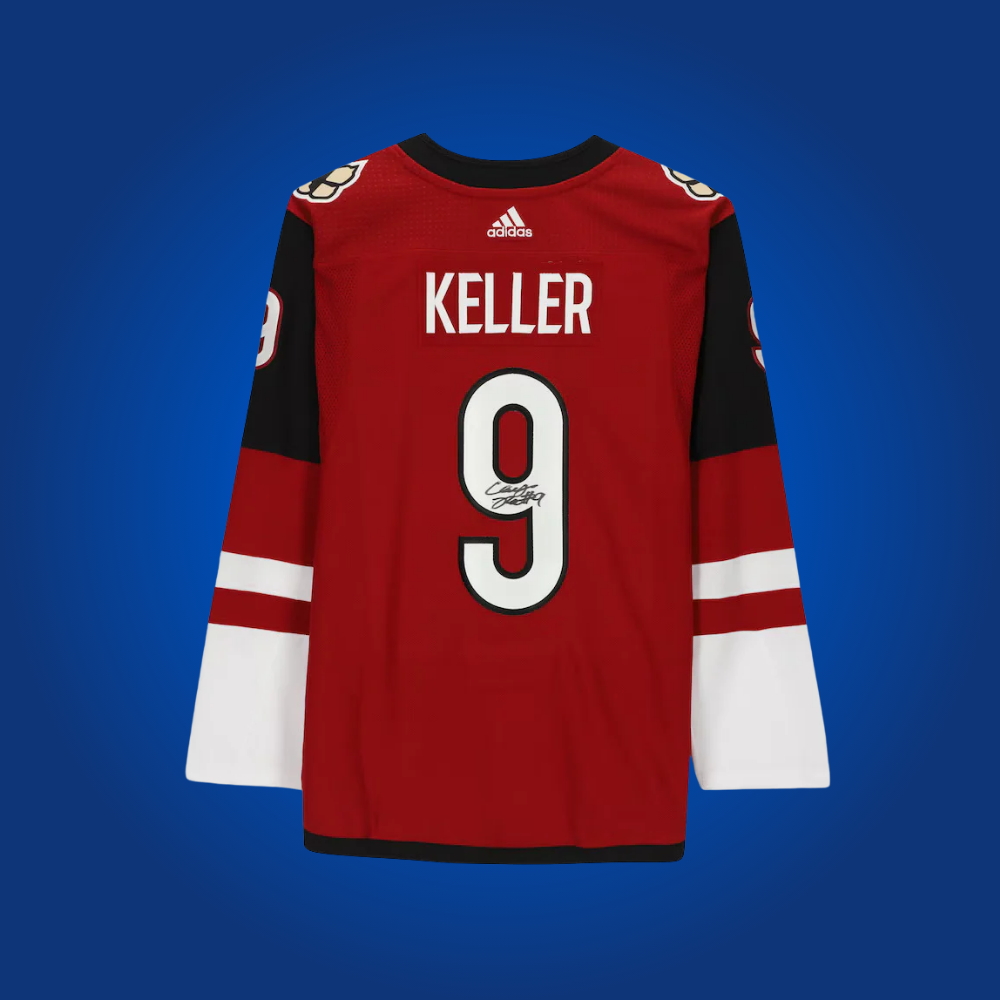 Clayton Keller’s autographed red custom jersey for the Arizona Coyotes is a vibrant collectible, ideal for fans looking to celebrate a current star’s achievements.