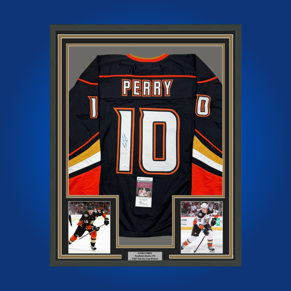 Signed and framed Corey Perry Anaheim Ducks jersey. A must-have for Ducks fans, highlighting Perry’s career with an authenticated signature and bold display, perfect for home or office.