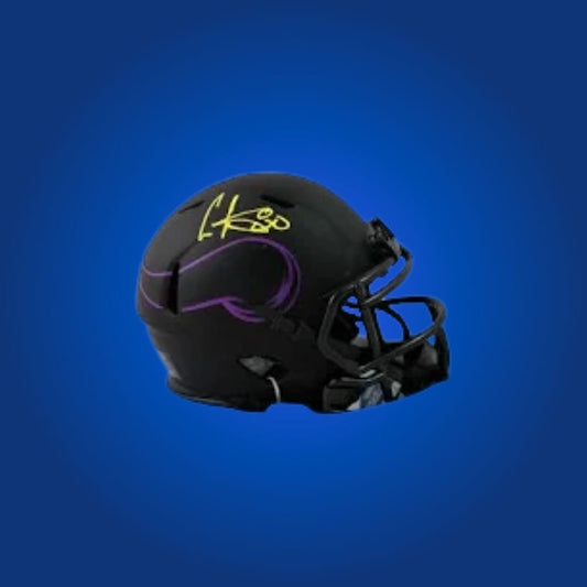 Minnesota Vikings mini helmet signed by Cris Carter with Certificate of Authenticity.