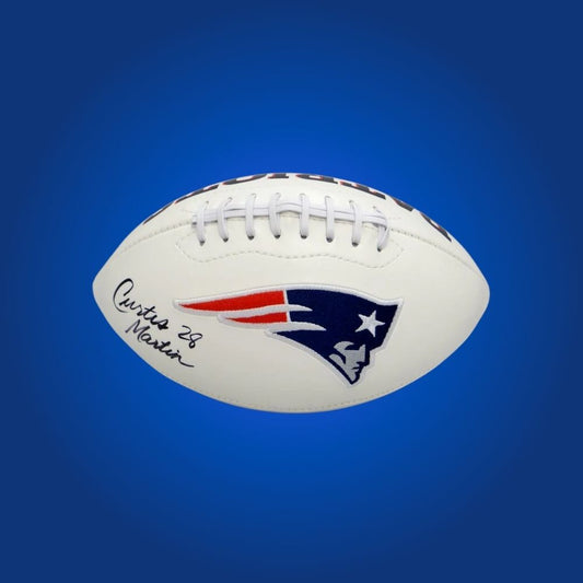 Football signed by Curtis Martin, with Patriots logo and visible signature for authenticity.