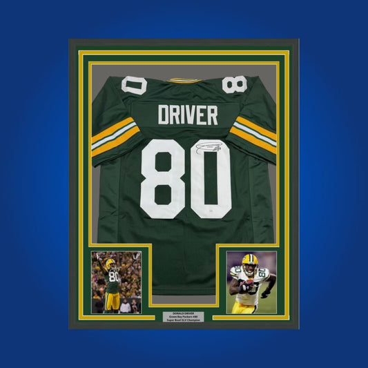 Custom framed jersey signed by Packers legend Donald Driver, includes two photos and COA.
