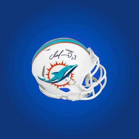 Miami Dolphins mini helmet signed by Dan Marino with Certificate of Authenticity.