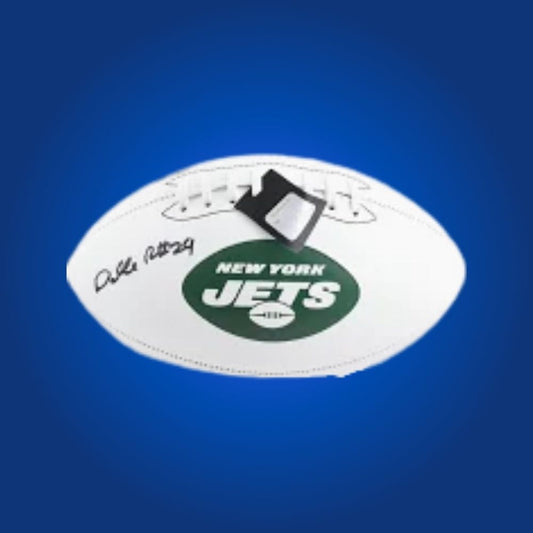 Darrelle Revis autographed New York Jets logo football, “Revis Island” era signature displayed.