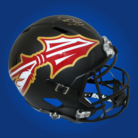 Autographed Florida State Seminoles full size replica helmet signed by Deion Sanders, displayed on a white background. SportsMarkets memorabilia image.
