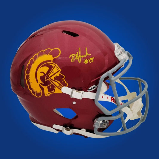 Autographed full size Authentic Helmet by Drake London, standout USC Trojans wide receiver, elegantly showcased on a white backdrop. A perfect addition for fans and memorabilia collectors. SportsMarkets product photo.