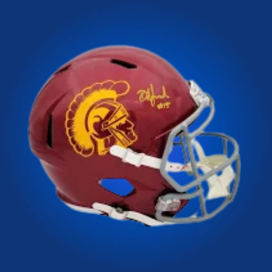 Autographed full size replica helmet by Drake London, star USC Trojans wide receiver and NFL draft pick, displayed on a neutral white background for a refined presentation. Perfect for memorabilia collectors and USC fans. SportsMarkets photo.