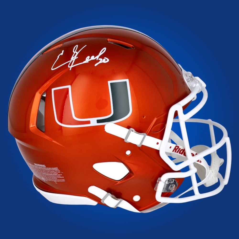 Autographed Miami Hurricanes full size Authentic Helmet signed by Ed Reed, displayed on a white background. SportsMarkets product image.