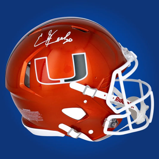 Autographed Miami Hurricanes full size Authentic Helmet signed by Ed Reed, displayed on a white background. SportsMarkets product image.