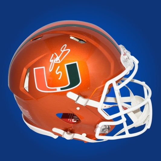 Autographed Miami Hurricanes full size Authentic Helmet signed by Edgerrin James, displayed on a white background. SportsMarkets memorabilia product image.
