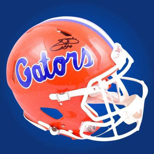 Autographed Florida Gators full size Authentic Helmet signed by Emmitt Smith, presented against a white background. SportsMarkets exclusive image.