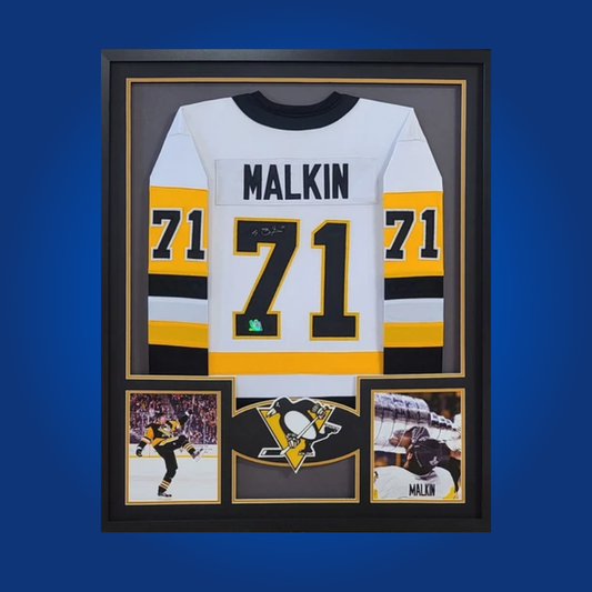 Evgeni Malkin’s full framed Pittsburgh Penguins yellow jersey, autographed, is a premier collectible for fans, honoring his integral role in the team’s championship successes.