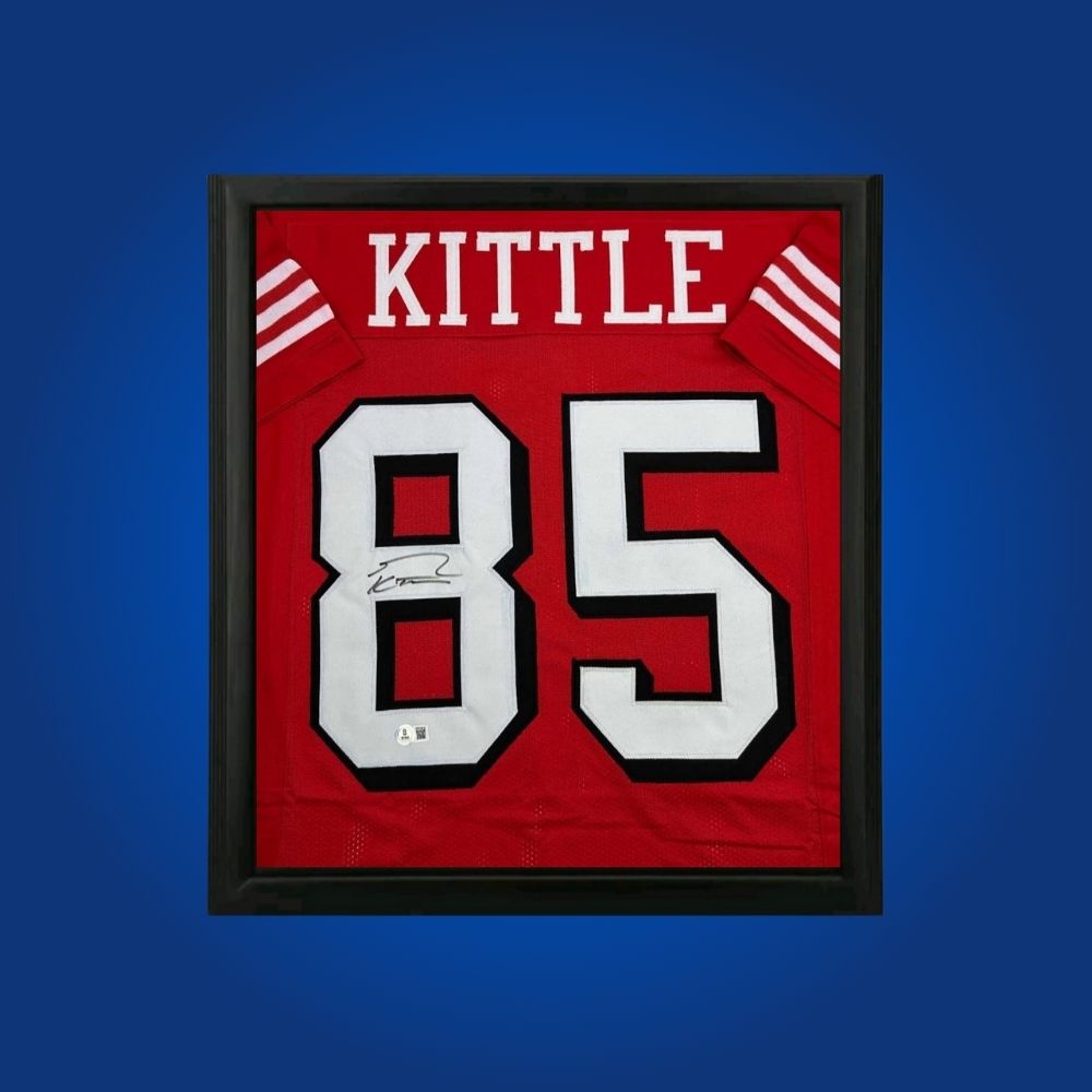 George Kittle hand-signed red framed San Francisco 49ers jersey, showcasing signature and official team graphics. A unique collectible for 49ers fans and Kittle memorabilia collectors. Includes Certificate of Authenticity. Images may differ for catalog uniformity.