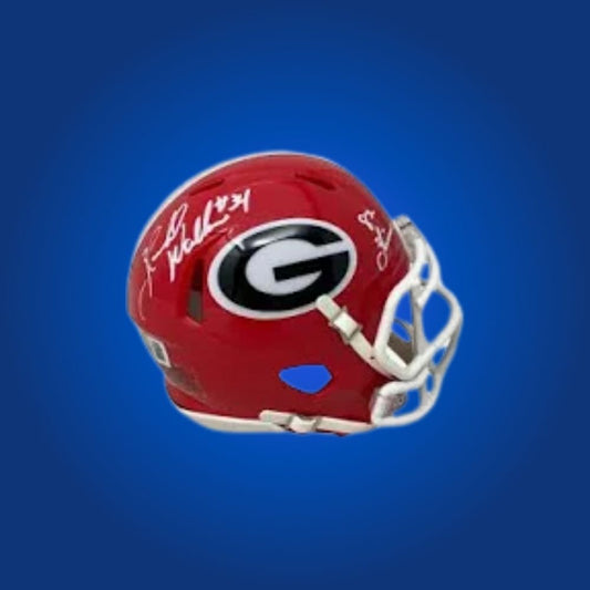 Herschel Walker signed Georgia Bulldogs mini helmet—legendary collectible for fans and football historians.