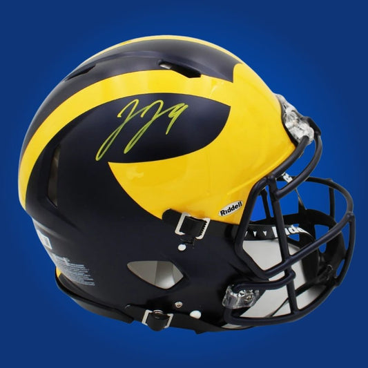 Autographed Michigan Wolverines full size Authentic Helmet signed by J.J. McCarthy, displayed on a white background. SportsMarkets product image.