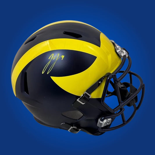 Autographed Michigan Wolverines full size replica helmet signed by J.J. McCarthy, displayed on a white background. SportsMarkets product image.