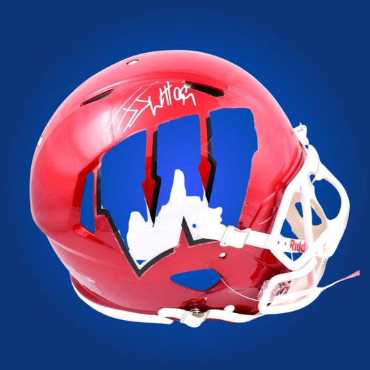 Autographed full size Authentic Helmet by J.J. Watt, legendary Wisconsin Badgers and NFL superstar, highlighted against a professional white backdrop. Perfect for dedicated collectors and Wisconsin fans. SportsMarkets product image.