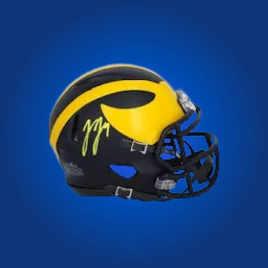 JJ McCarthy autographed Michigan Wolverines mini helmet—prized collectible for Michigan fans and McCarthy enthusiasts.
