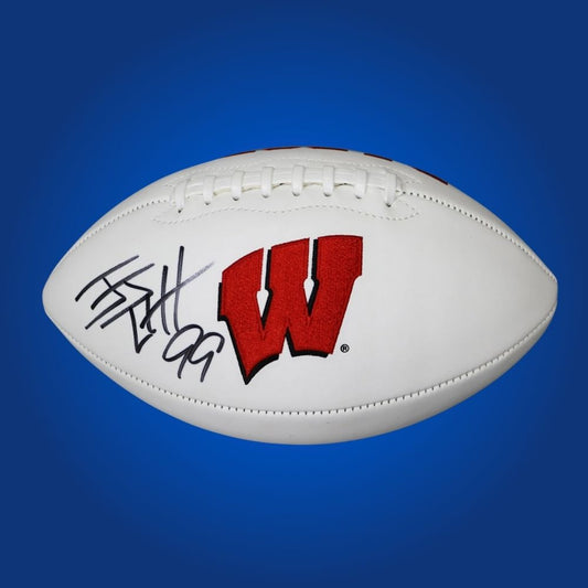 Autographed full size replica football by JJ Watt, featuring Wisconsin Badgers white logo. Certified authentic, an outstanding collectible for dedicated Badgers fans and sports memorabilia enthusiasts. Certificate of Authenticity included. Ball details may differ for catalog consistency.