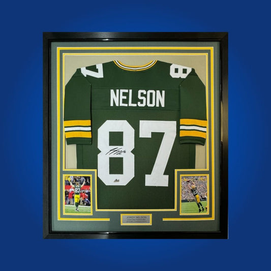Framed custom Packers jersey signed by Jordy Nelson with two photos and COA.