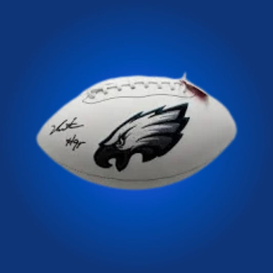 Jalen Carter signed Philadelphia Eagles logo football, displaying clear autograph and team logo.