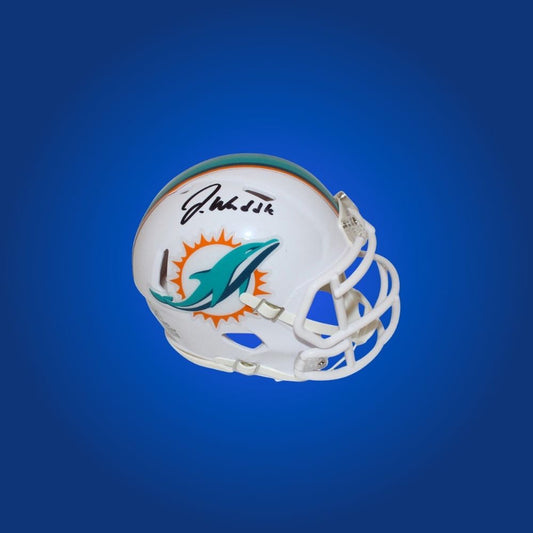 Miami Dolphins mini helmet signed by Jalen Waddle with Certificate of Authenticity.