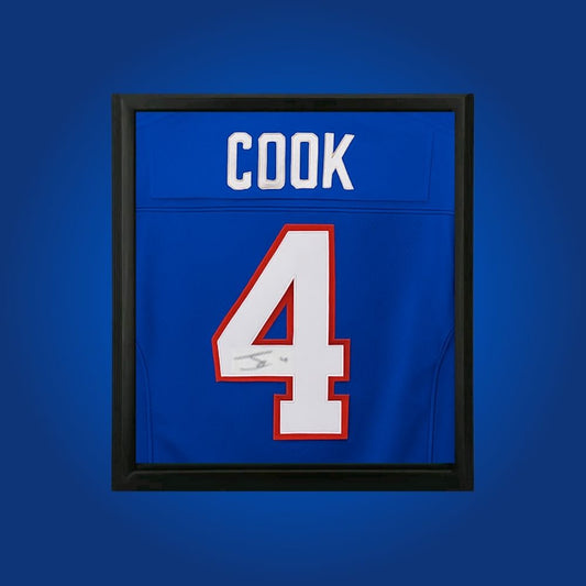 James Cook hand-signed blue framed Buffalo Bills jersey, showcasing signature and official team graphics. A unique collectible for Bills fans and Cook memorabilia collectors. Includes Certificate of Authenticity. Images may differ for catalog uniformity.