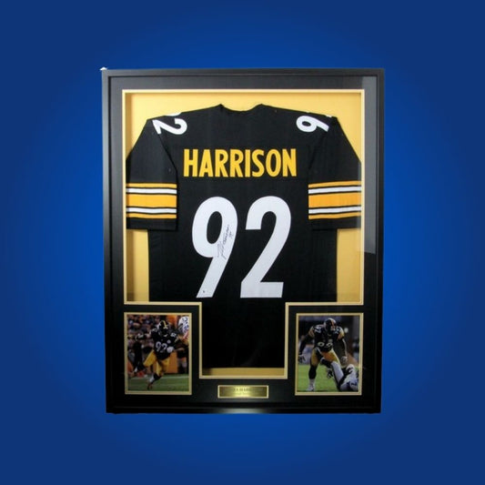 Autographed Pittsburgh Steelers custom jersey by James Harrison with Certificate of Authenticity.