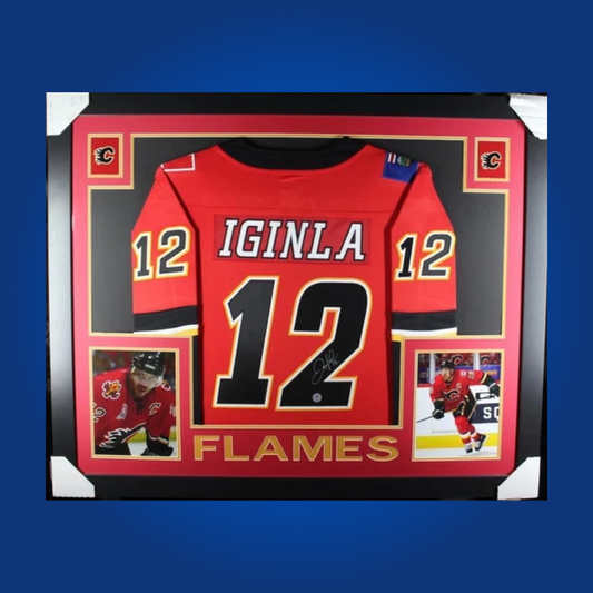 Jarome Iginla’s autographed full framed Calgary Flames red jersey stands out as a centerpiece for any hockey collection, celebrating the career of a true Flames legend.