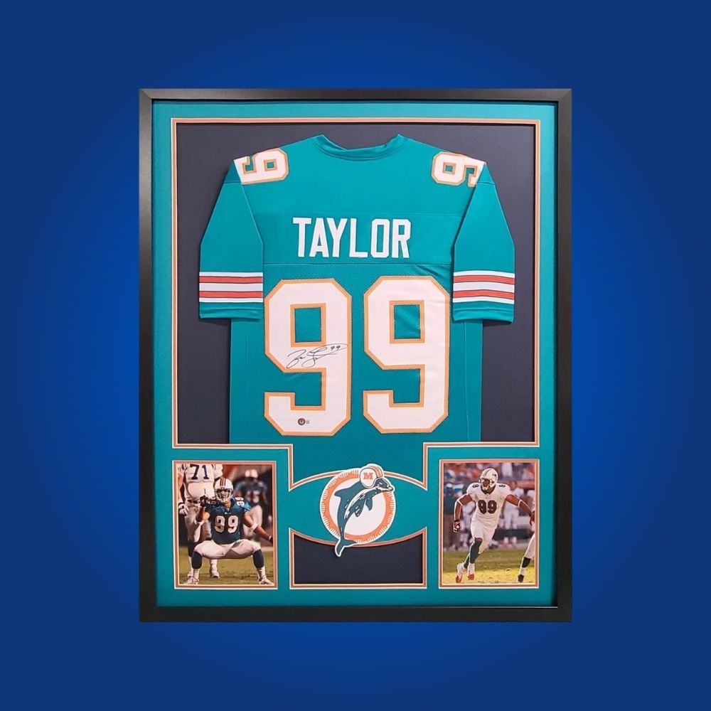 Autographed Miami Dolphins custom jersey by Jason Taylor with Certificate of Authenticity.