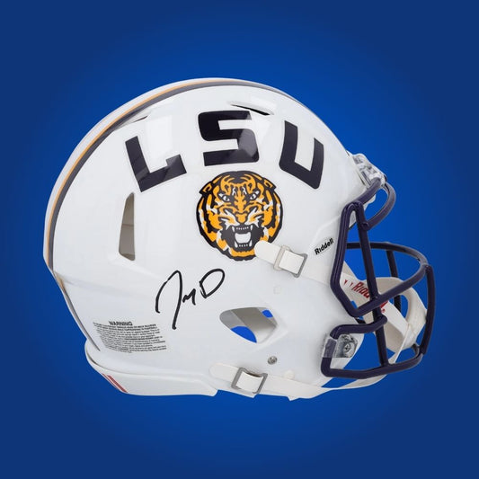 Autographed LSU Tigers full size Authentic Helmet signed by Jayden Daniels, shown on a white background. SportsMarkets exclusive memorabilia image.
