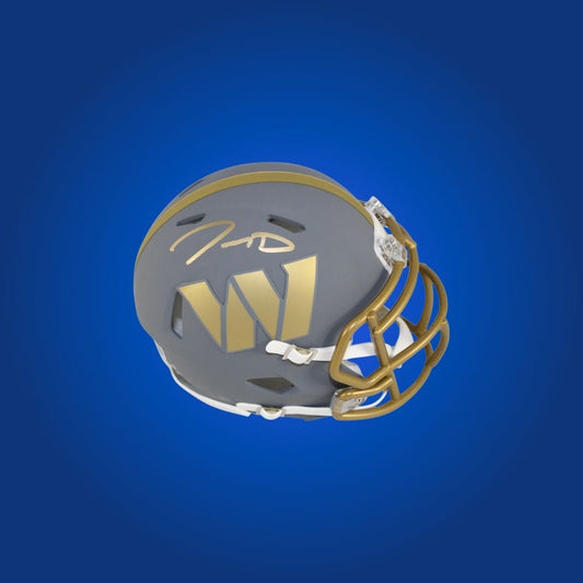 Washington Commanders mini helmet signed by Jayden Daniels with Certificate of Authenticity.