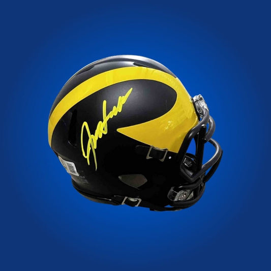 Jim Harbaugh signed Michigan Wolverines mini helmet—unique collectible for Michigan fans and coaching memorabilia seekers.