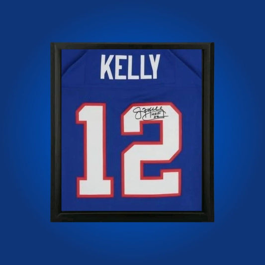 Jim Kelly hand-signed blue framed Buffalo Bills jersey, showcasing signature and official team graphics. A unique collectible for Bills fans and Kelly memorabilia collectors. Includes Certificate of Authenticity. Images may differ for catalog uniformity.