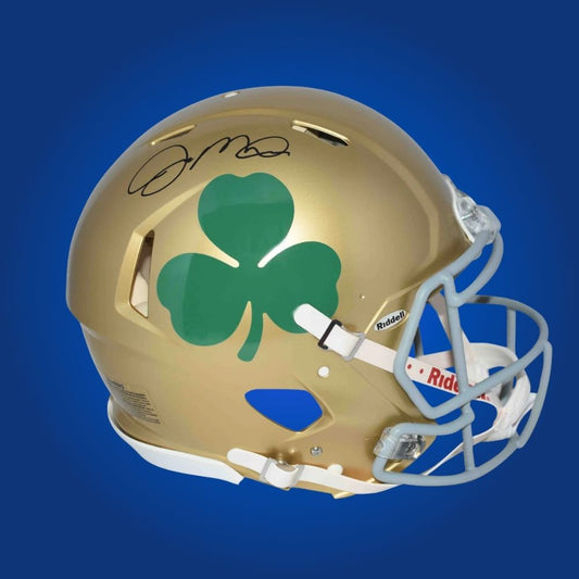 Autographed Notre Dame Fighting Irish full size Authentic Helmet signed by Joe Montana, featured on a white background. SportsMarkets authentic memorabilia image.