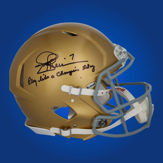 Autographed Notre Dame Fighting Irish full size Authentic Helmet signed by Joe Theismann, displayed on a white display background. SportsMarkets memorabilia image.