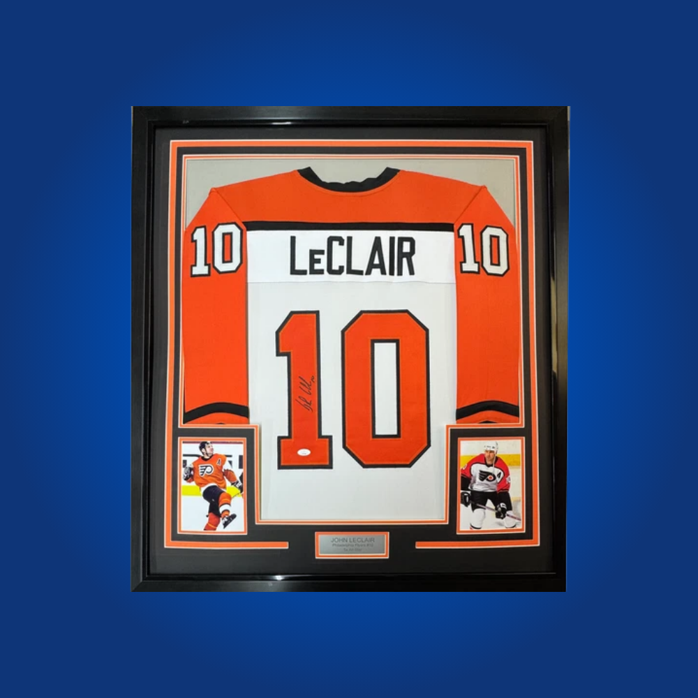 John LeClair’s signed full framed Philadelphia Flyers white jersey is a classic collectible, commemorating the power forward’s contributions to Flyers history and the “Legion of Doom.”