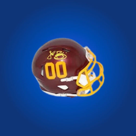 Washington Commanders mini helmet signed by John Riggins with Certificate of Authenticity.