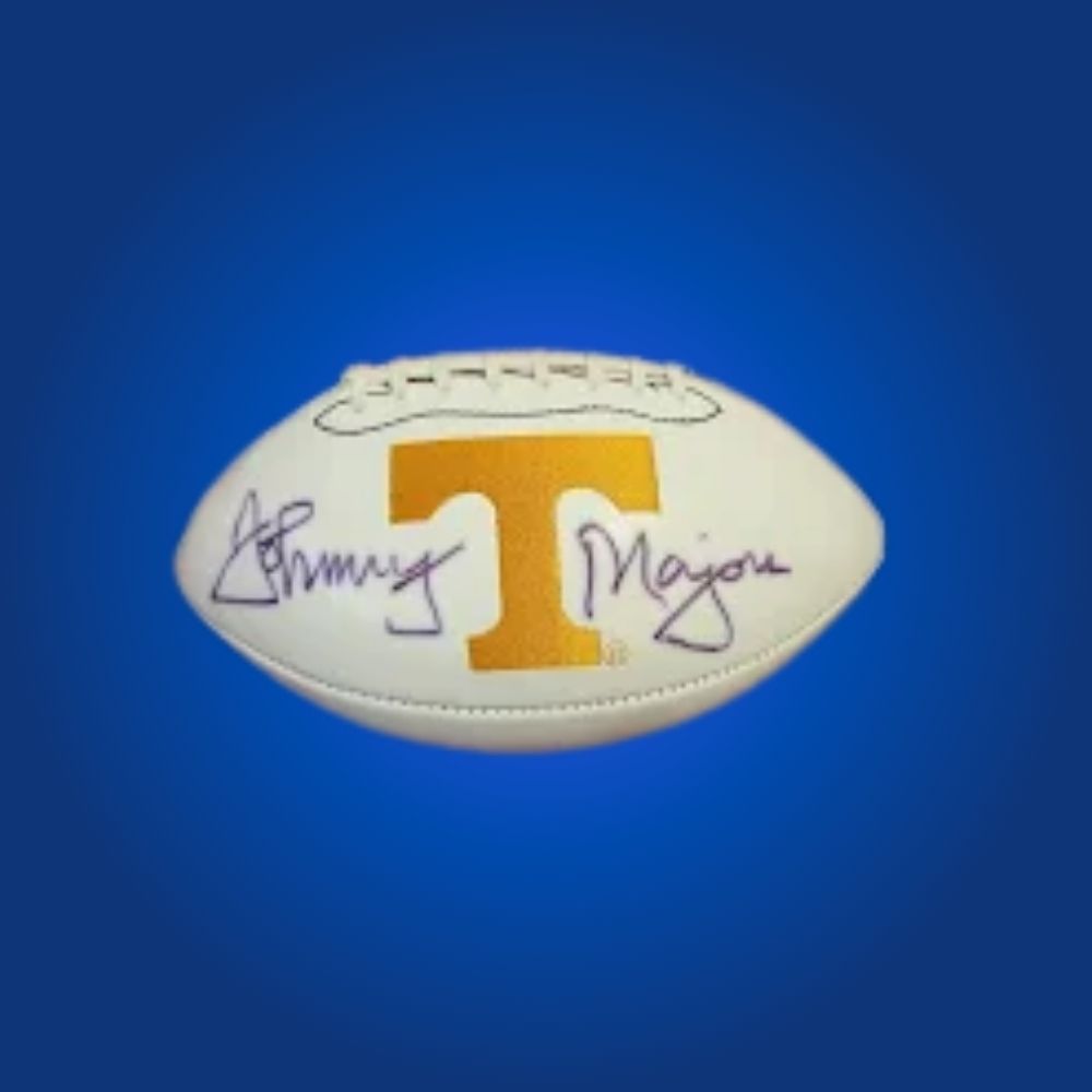 Autographed full size replica helmet by Johnny Majors, featuring Tennessee Volunteers white logo. Certified authentic, an excellent collectible for Tennessee Volunteers supporters and memorabilia enthusiasts. Certificate of Authenticity included. Helmet details may vary for catalog consistency.