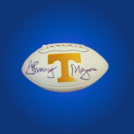 Autographed full size replica helmet by Johnny Majors, featuring Tennessee Volunteers white logo. Certified authentic, an excellent collectible for Tennessee Volunteers supporters and memorabilia enthusiasts. Certificate of Authenticity included. Helmet details may vary for catalog consistency.