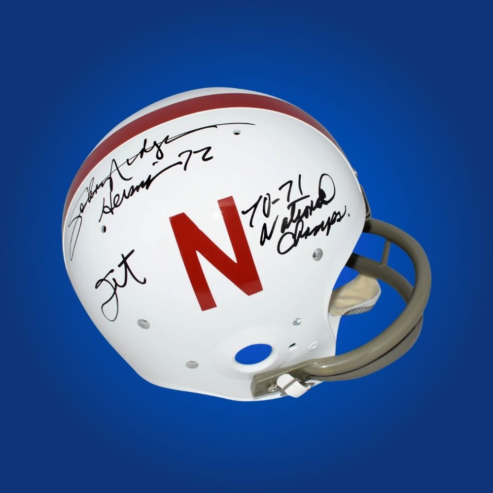 Autographed Nebraska Cornhuskers full size Authentic Helmet signed by Johnny Rodgers, showcased on a white background for clarity. SportsMarkets collectible image.