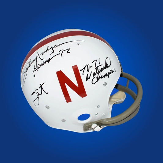 Autographed Nebraska Cornhuskers full size Authentic Helmet signed by Johnny Rodgers, showcased on a white background for clarity. SportsMarkets collectible image.