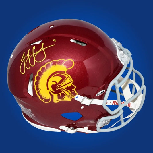 Autographed full size Authentic Helmet by JuJu Smith-Schuster, dynamic USC Trojans wide receiver and NFL standout, presented against a white background for a professional display. An excellent collectible for USC fans. SportsMarkets product image.