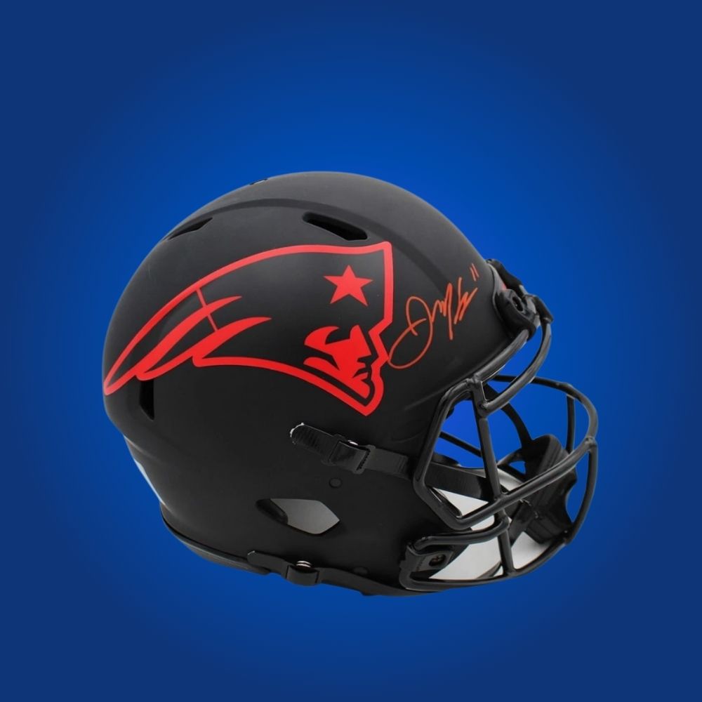 Julian Edelman hand-signed New England Patriots blackout authentic helmet, showcasing signature and official team graphics. A unique collectible for Patriots fans and Edelman memorabilia collectors. Includes Certificate of Authenticity. Images may differ for catalog uniformity.