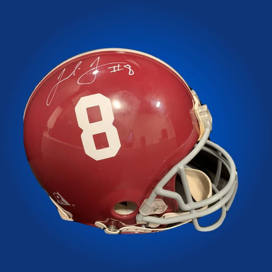 Autographed Alabama Crimson Tide full size Authentic Helmet signed by Julio Jones, shown against a white background. SportsMarkets exclusive product image.
