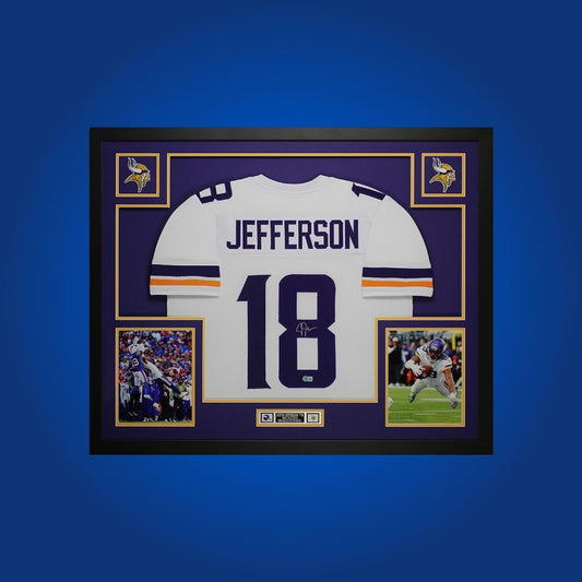 Autographed Minnesota Vikings custom jersey by Justin Jefferson with Certificate of Authenticity.